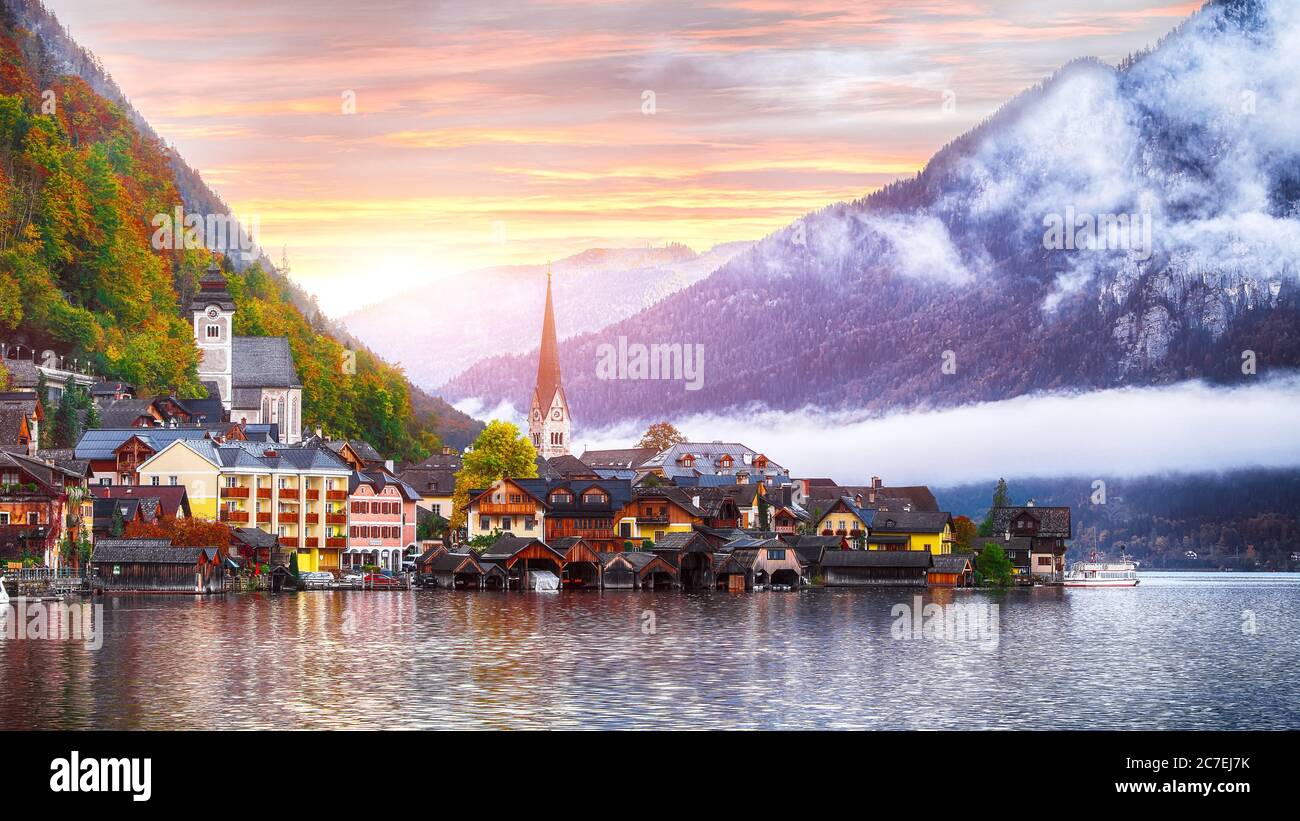 Scenic view of famous Hallstatt mountain village with Hallstatter lake ...