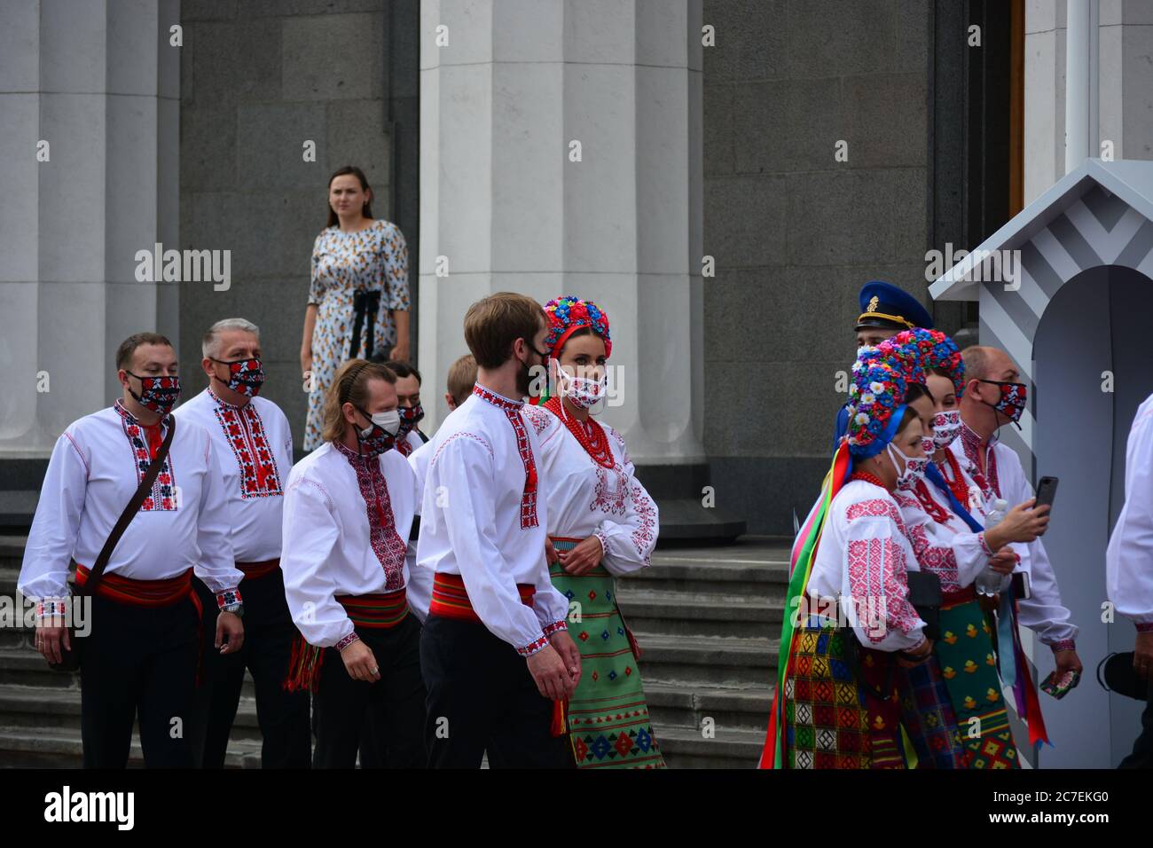Coronavirus outbreak: Government prolongs adaptive quarantine until July 31 in Ukraine. Members of the Ukrainian choir in national costumes walk down Stock Photo