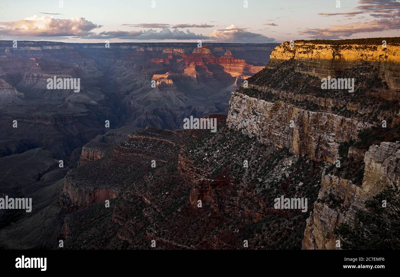 Bird'-eye shot of the beautiful Grand Canyon with red, brown and grey rocky mountains Stock Photo