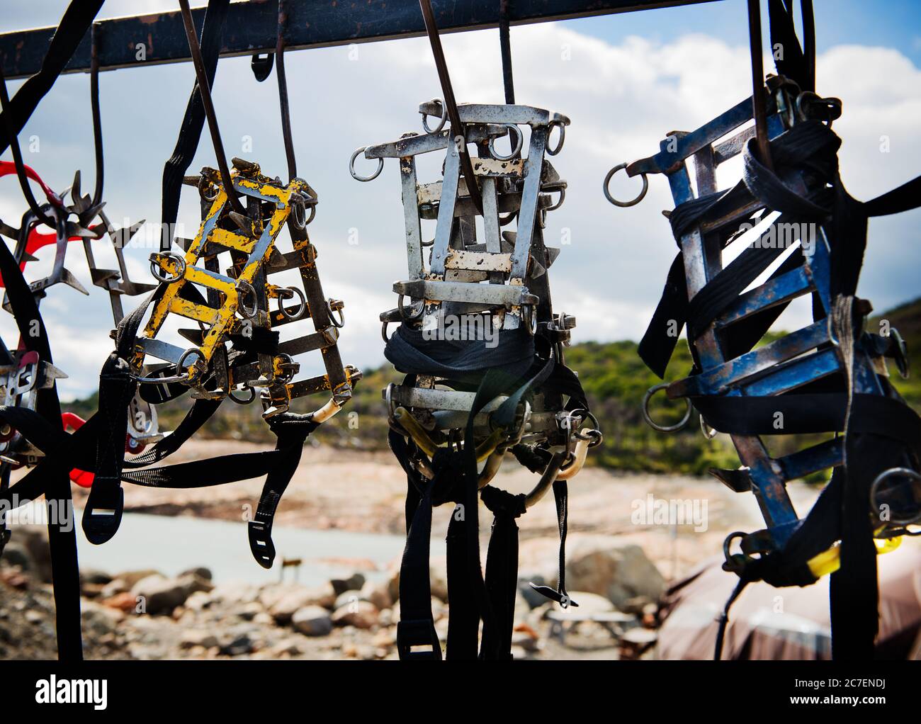 Metal Crampons hanging outside the perito moreno glacier, Argentina, Patagonia, South America Stock Photo