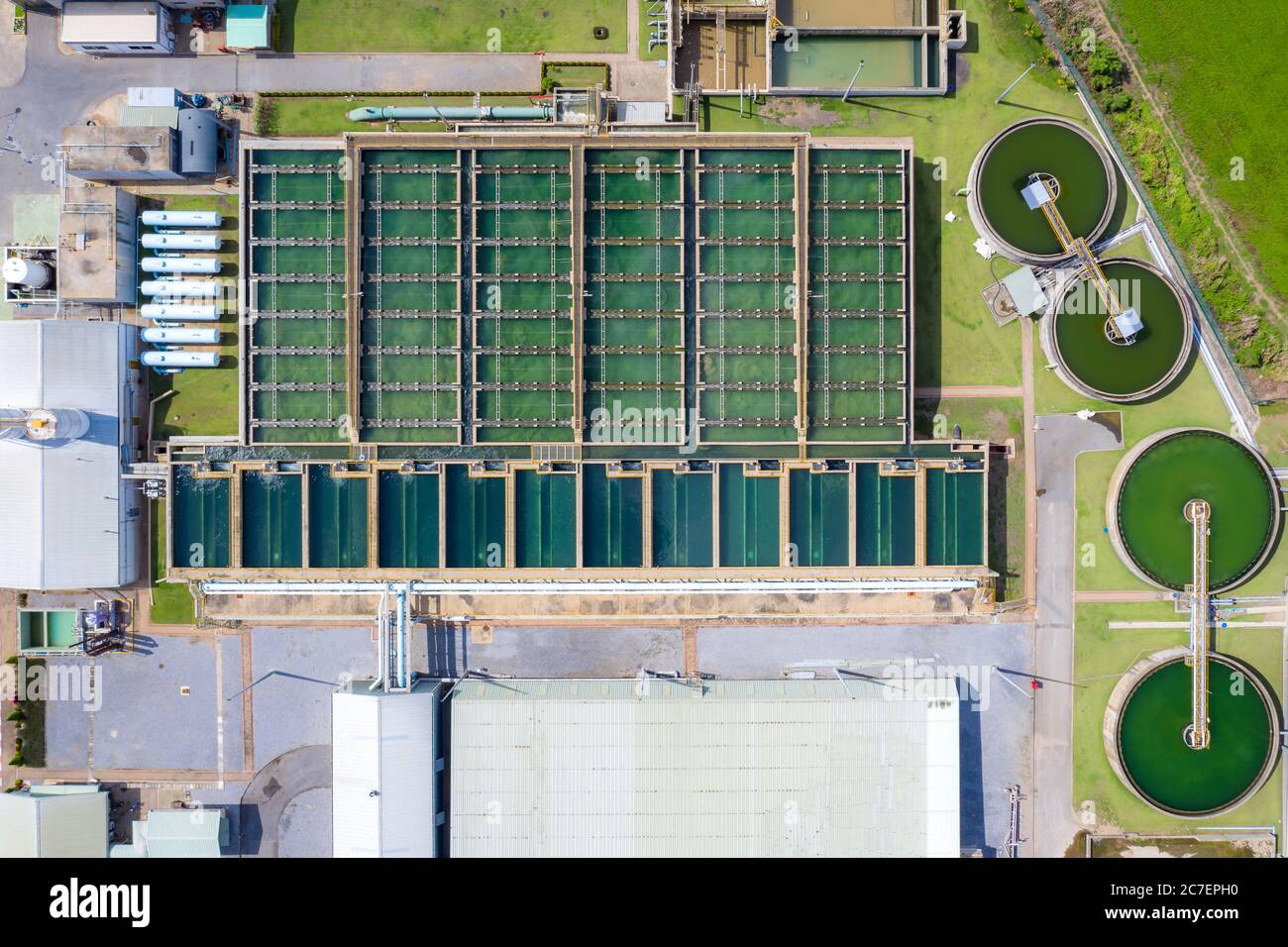 Aerial view of The Solid Contact Clarifier Tank type Sludge Recirculation in Water Treatment plant during working manufacturing clean wather. Stock Photo