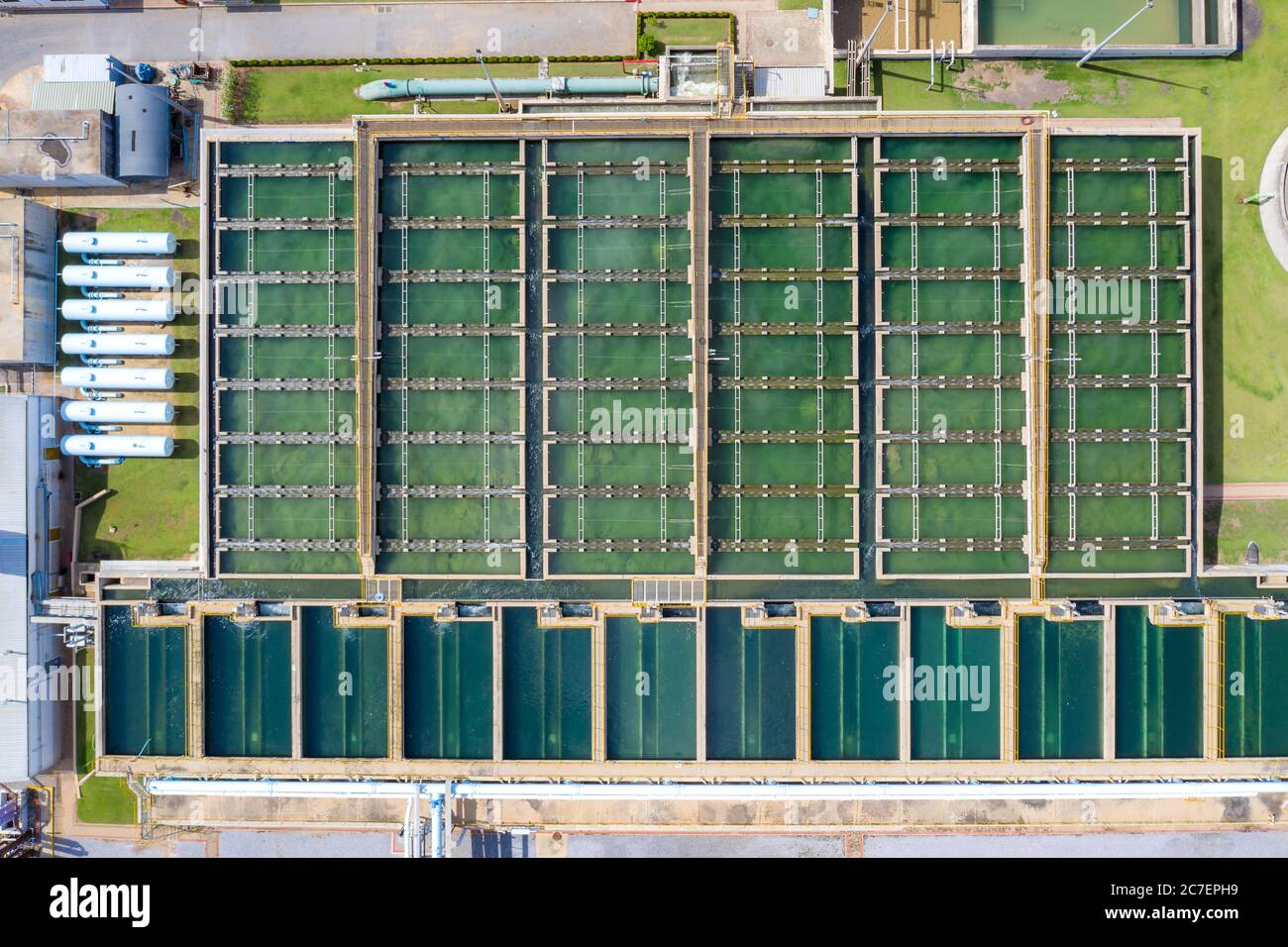 Aerial view of The Solid Contact Clarifier Tank type Sludge Recirculation in Water Treatment plant during working manufacturing clean wather. Stock Photo