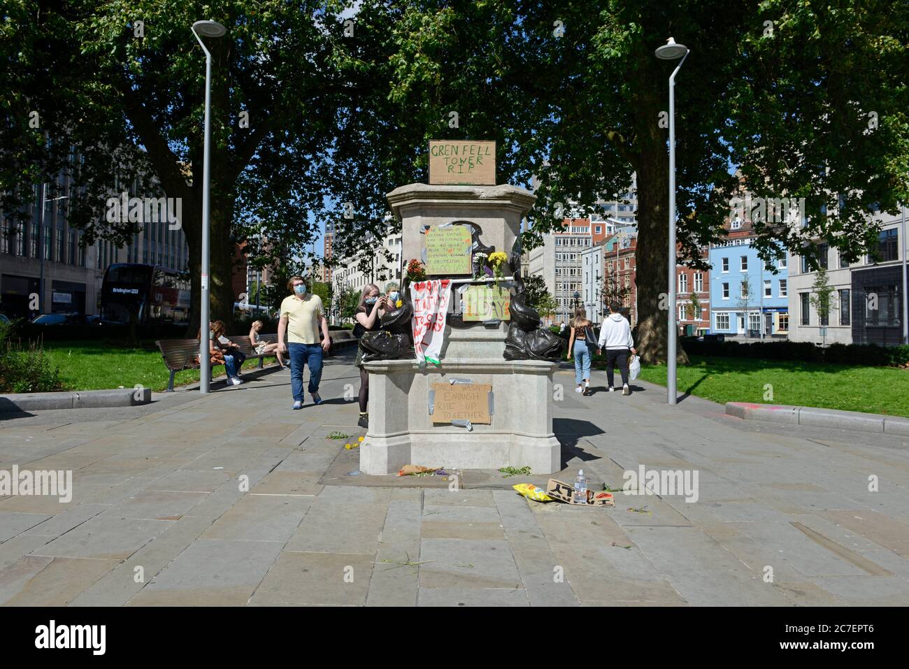 The plinth on which the 'A Surge of Power (Jen Reid)' statue stood  for just one day in July 2020 in Bristol, UK, after removal, with many messages. Stock Photo