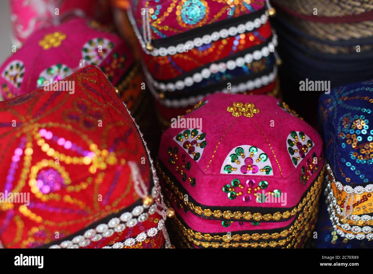 Closeup shot of beautiful colorful containers with Chinese embroidery art Stock Photo