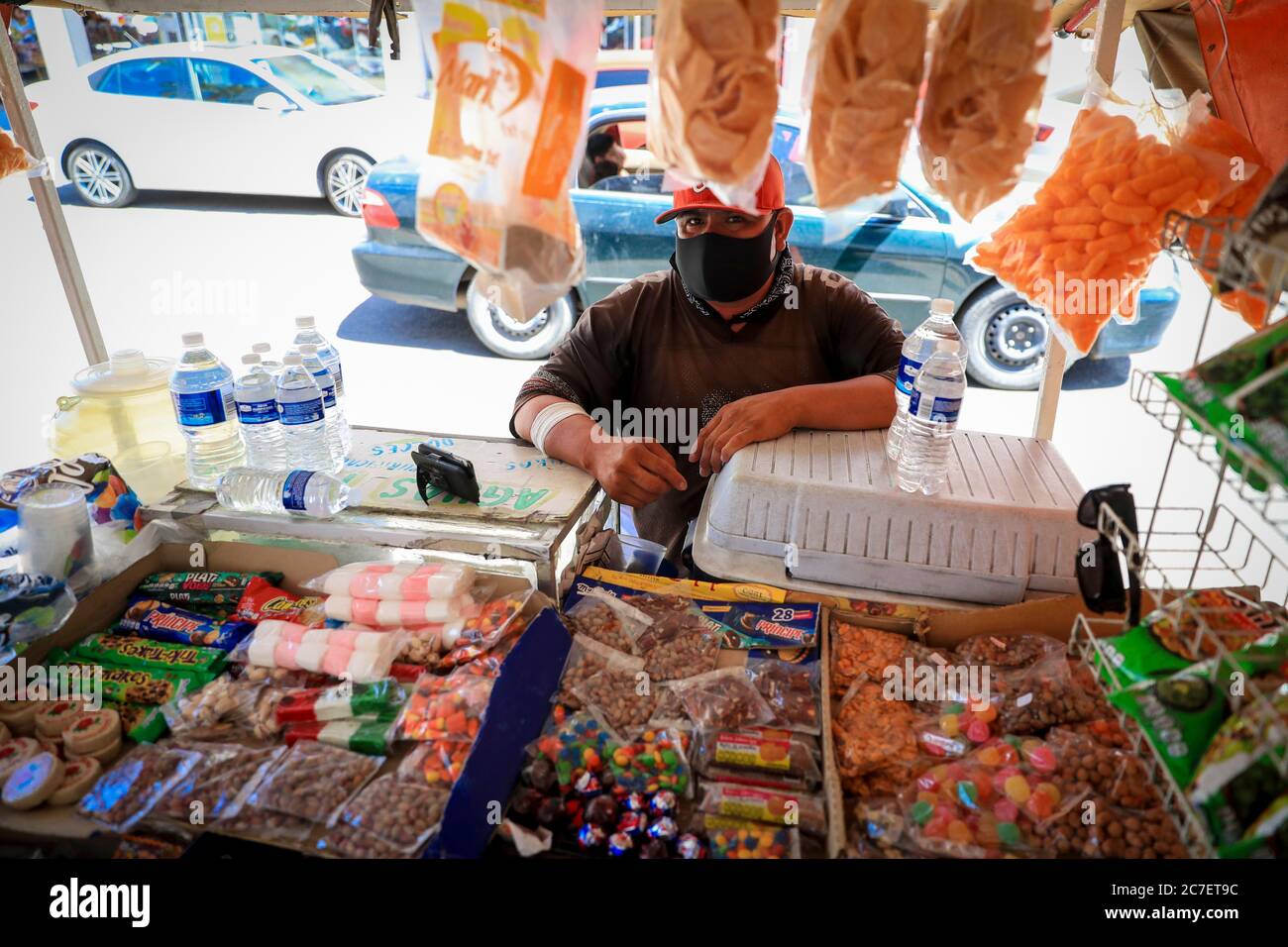 HERMOSILLO, MEXICO - JULY 16 :A street vendor of sweets resumed commercial activity in the center where the total reopening of shops is carried out while the red alert continues in the city for the covid-19 pandemic on July 16, 2020 in Hermosillo, Mexico. (Photo by Luis Gutierrez/ Norte Photo/)   .. Vendedor de Dulces, ambulante Stock Photo