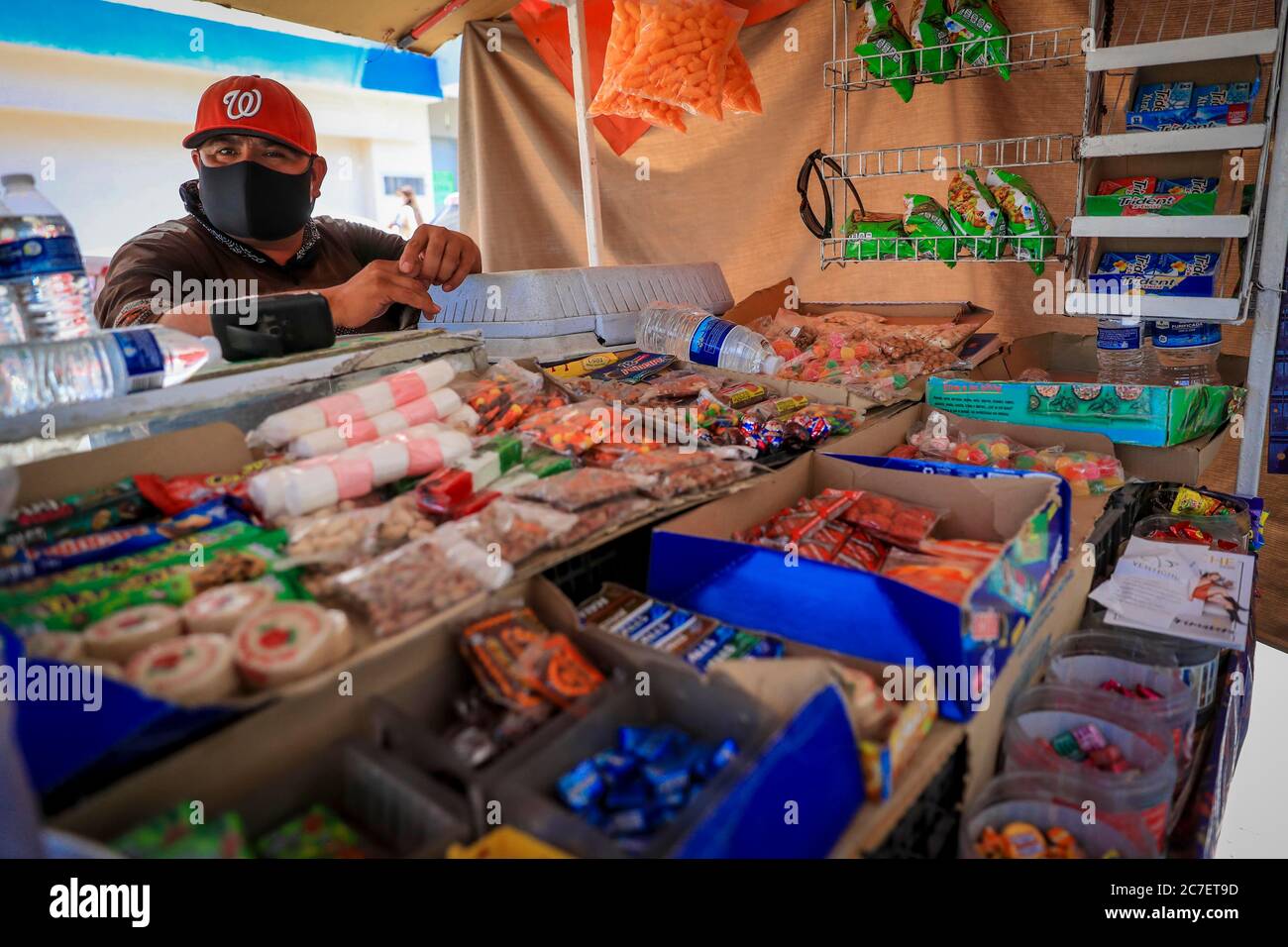 HERMOSILLO, MEXICO - JULY 16 :A street vendor of sweets resumed commercial activity in the center where the total reopening of shops is carried out while the red alert continues in the city for the covid-19 pandemic on July 16, 2020 in Hermosillo, Mexico. (Photo by Luis Gutierrez/ Norte Photo/)   .. Vendedor de Dulces, ambulante Stock Photo