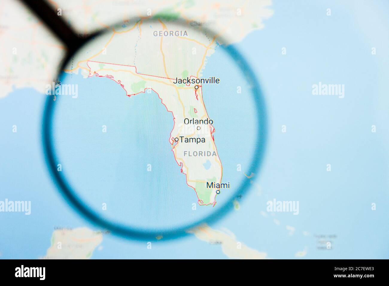 Los Angeles, California, USA - 15 March 2019: Florida, FL state of America visualization illustrative concept on display screen through magnifying Stock Photo