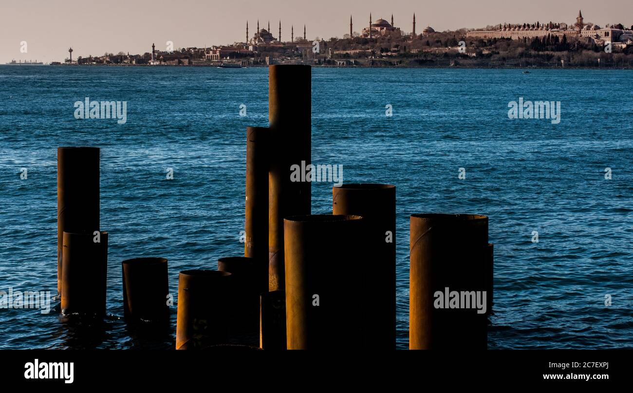 Metal pipe stakes seen in the sea waters Stock Photo - Alamy