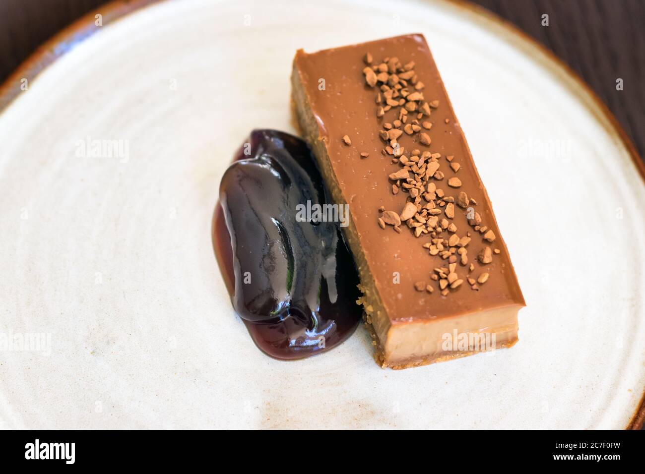 Gourmet dessert. Chocolate Tart with coffee cream Stock Photo