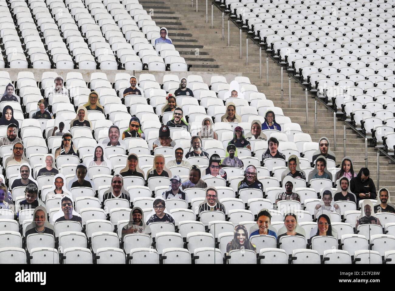 (200717) -- SAO PAULO, July 17, 2020 (Xinhua) -- Cutout photos of fans are seen on the stand at the Arena Corinthians in Sao Paulo, Brazil, July 16, 2020. Sao Paulo's regional football championship will resume on July 22. Matches will be played behind closed doors and under strict sanitary protocols. The Brazilian government reported on Thursday that the country has registered over 2 million cases of the novel coronavirus after 45,403 new cases were confirmed in the last 24 hours, for a total of 2,012,151. According to the Ministry of Health, 1,322 deaths were recorded in the last 24-hour peri Stock Photo