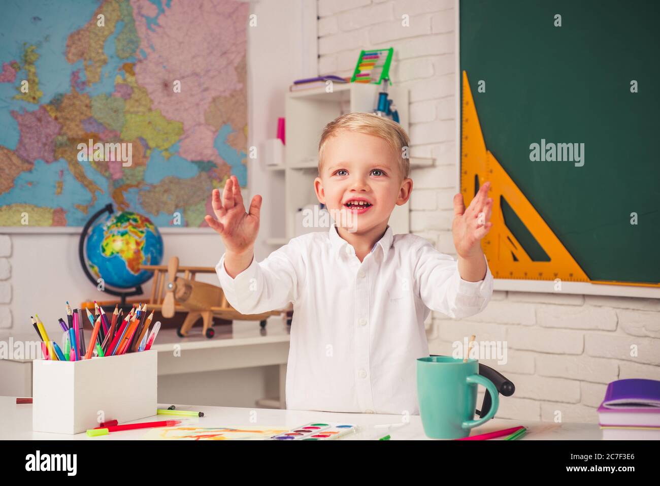 Happy Child learning. Funny Kid from primary school. School teaching Stock Photo