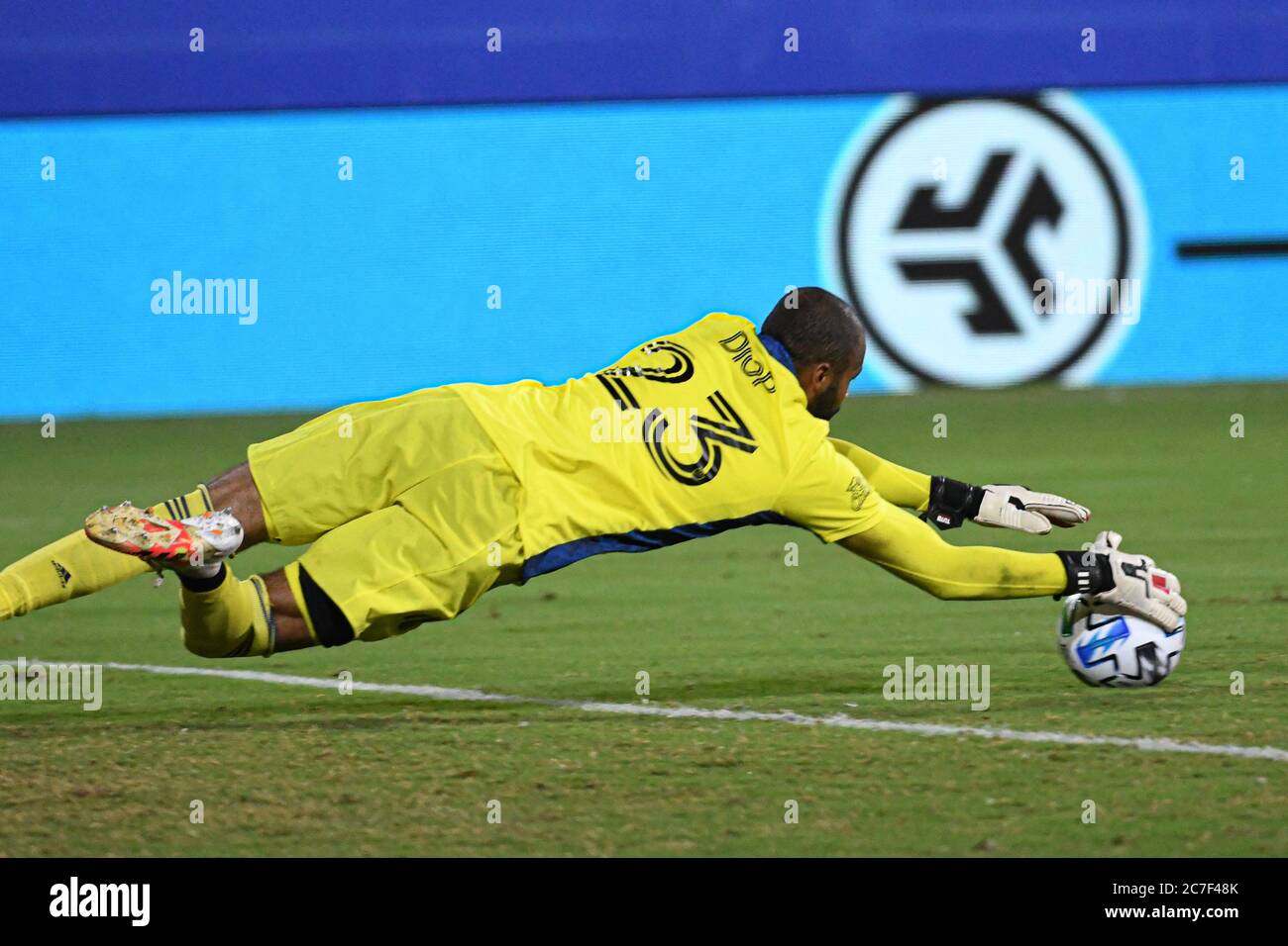 Orlando Florida, USA. 16th July 2020. Montreal Impact Goalkeeper Diop, Clement #23 makes a save during the MLS is Back Tournament at ESPN Wild World of Sports in Orlando Florida on Thursday July 16, 2020.  Photo Credit:  Marty Jean-Louis Credit: Marty Jean-Louis/Alamy Live News Stock Photo