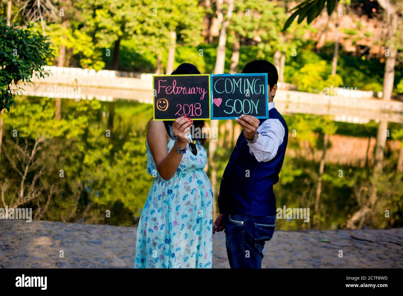 Indian Parents Posing For Baby Shower Photo Shoot With Various Props Stock  Photo - Download Image Now - iStock