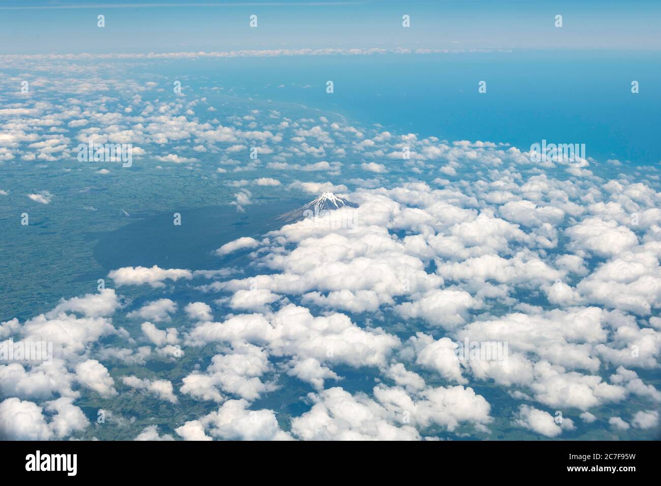 Mount Taranaki with clouds, aerial view, North Island, New Zealand Stock Photo