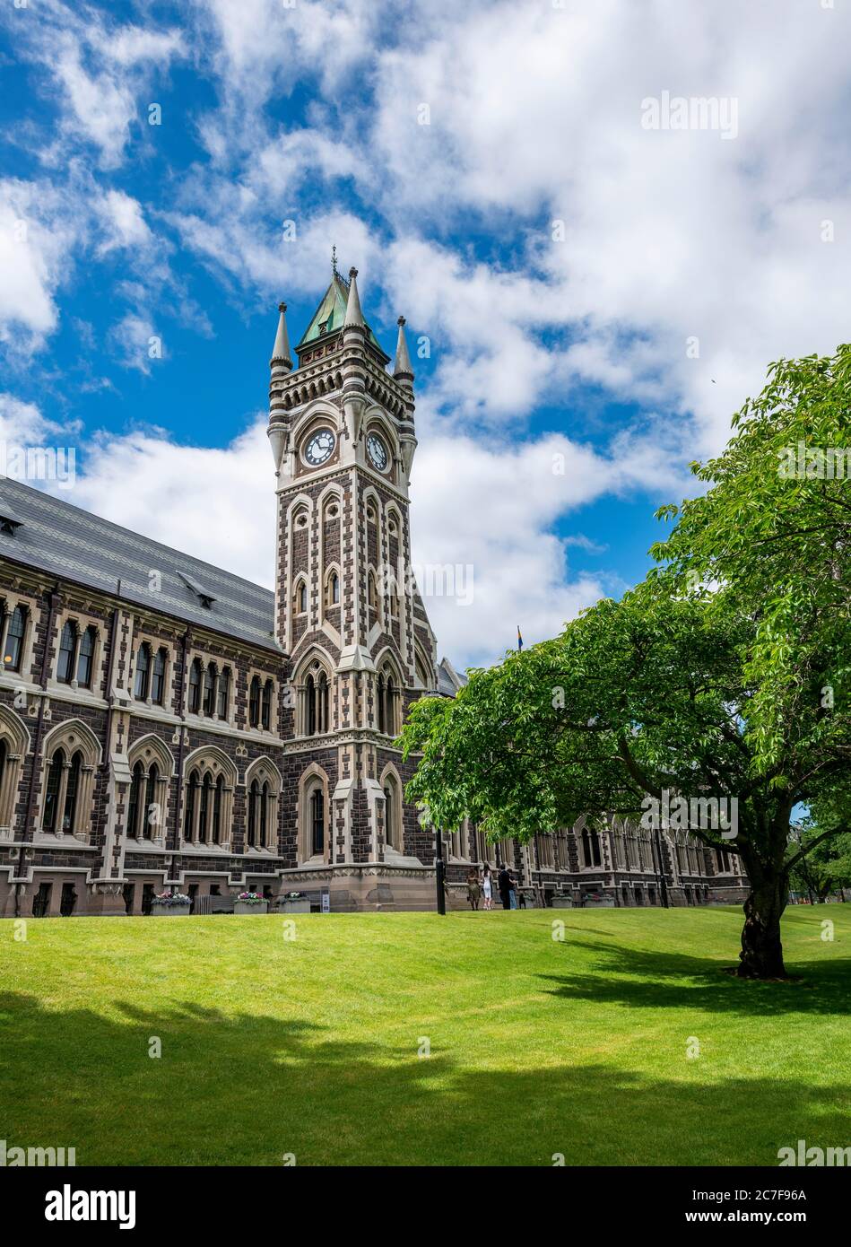 Old neo-gothic main building with bell tower, University of Otago, Dunedin, Otago region, New Zealand Stock Photo