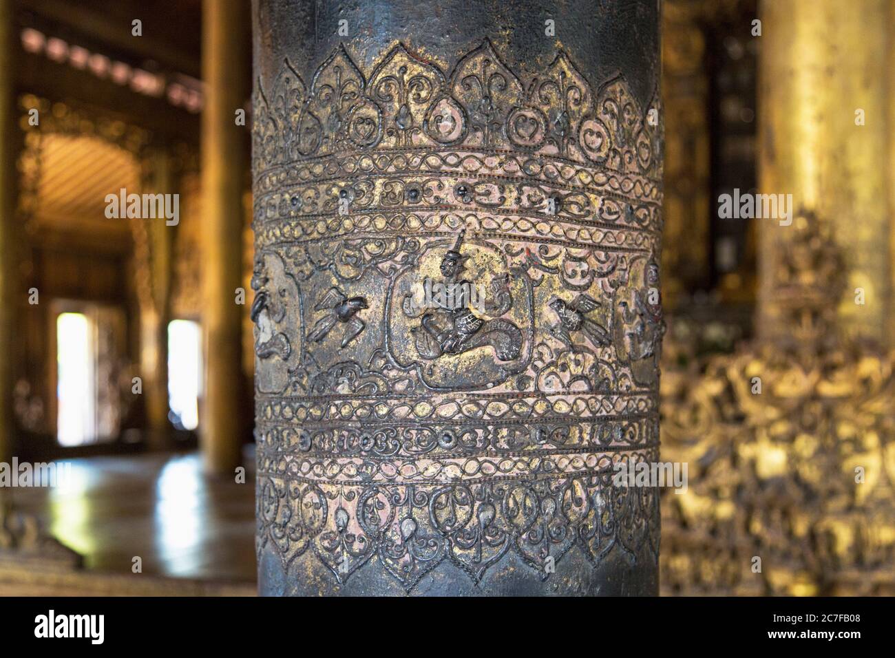 Close-up detail of a carved column in a temple in Yangon, Myanmar Stock Photo