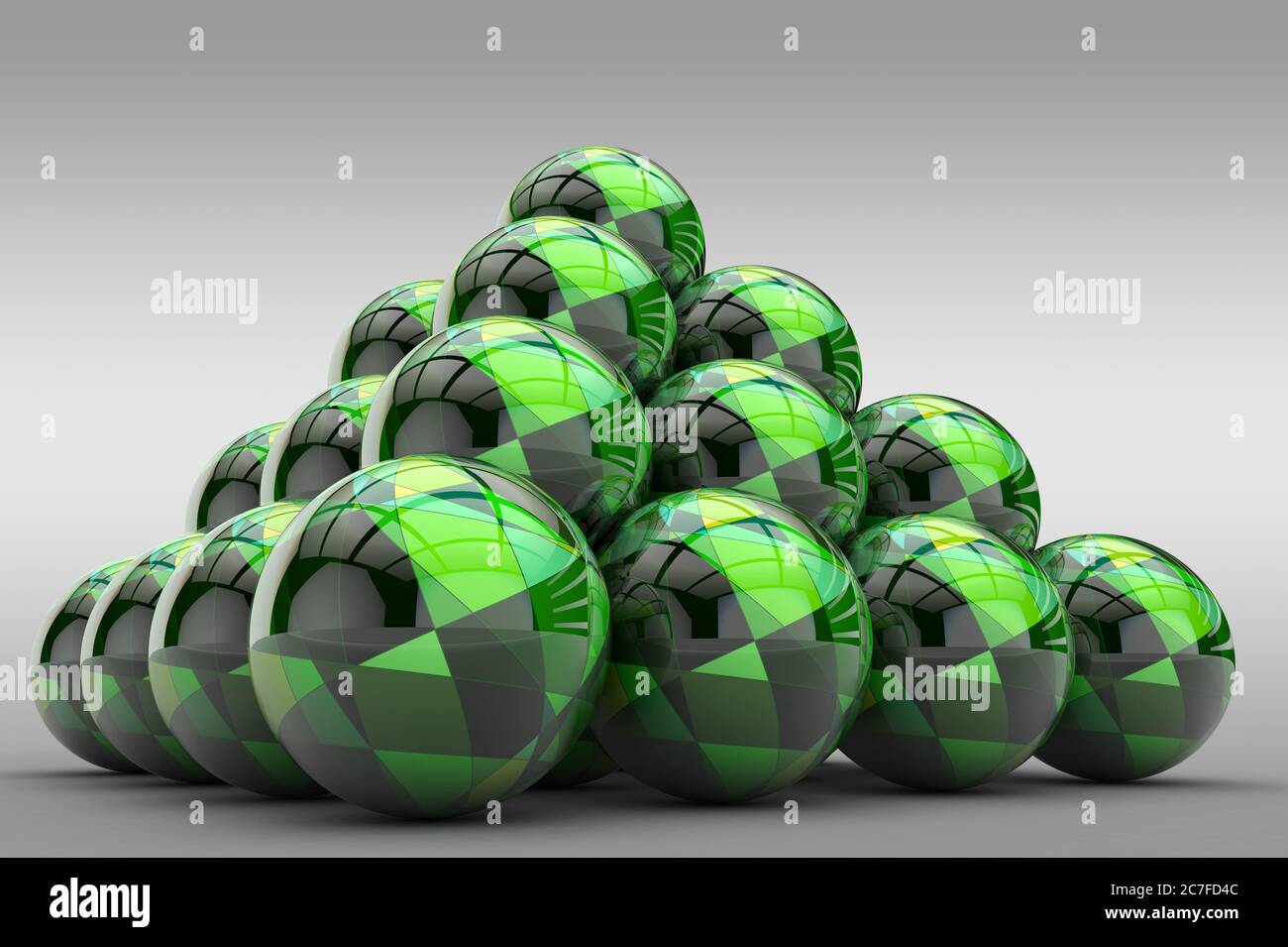 3D pyramid of spheres with a glossy finish and an abstract pattern in the form of geometric shapes Stock Photo