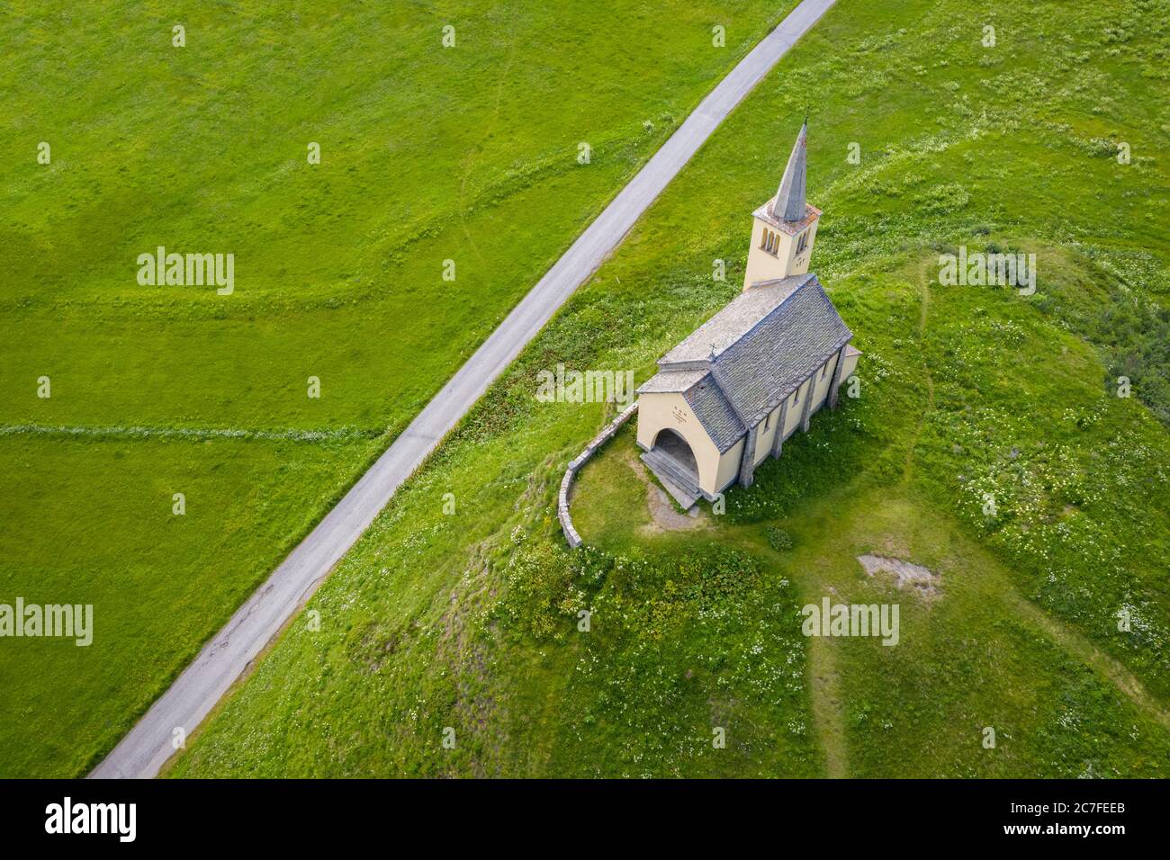 Aerial view of the Oratorio di Sant'Anna church in summer. Riale, Formazza, Valle Formazza, Verbano Cusio Ossola, Piedmont, Italy. Stock Photo