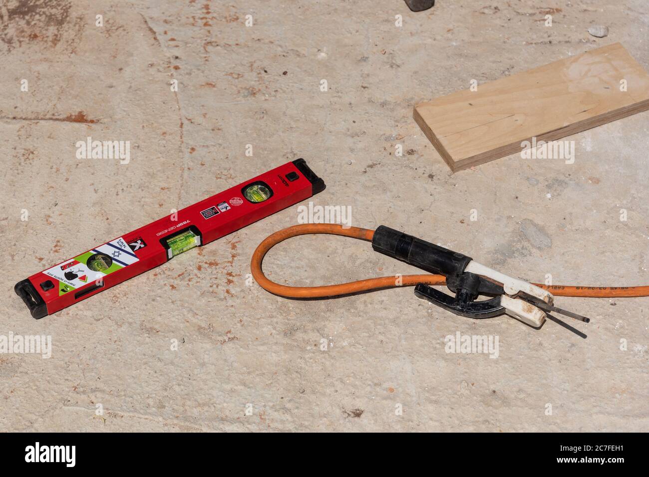 Carpentry measure, plan and design tools on raw wood background ...