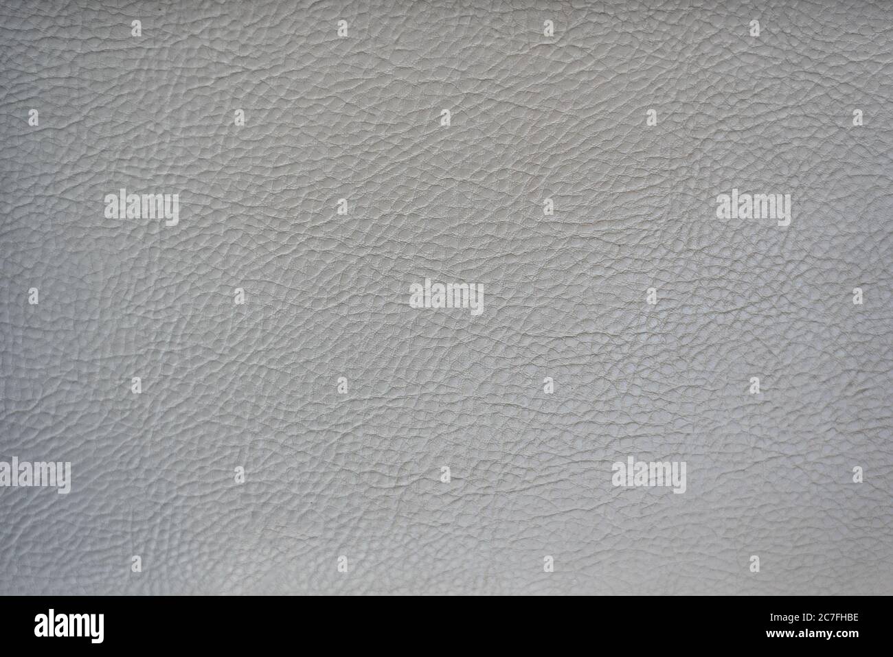 Light gray leather smooth surface. Backgrounds and textures. Stock Photo