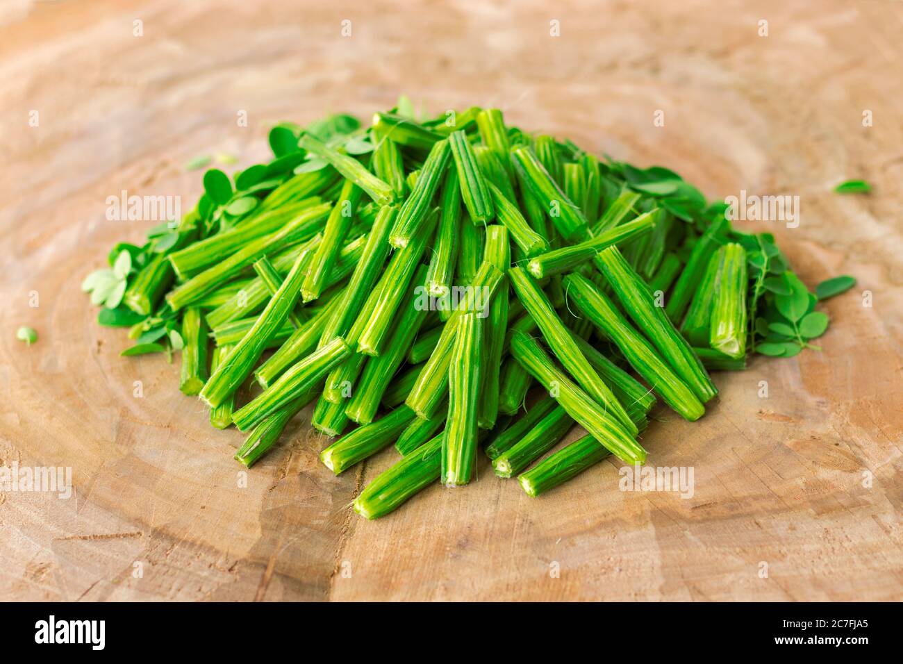 healthy drumsticks with wooden backrgound Stock Photo Alamy