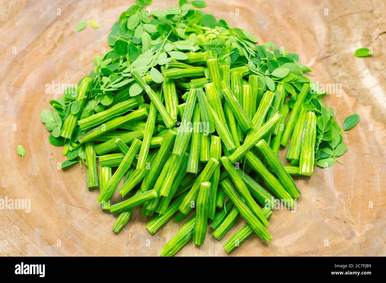 healthy drumsticks with wooden backrgound Stock Photo Alamy