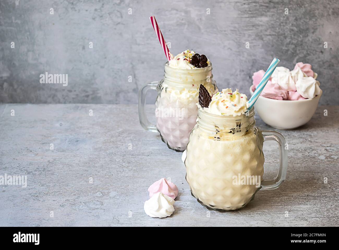 Ice cream milkshakes with whipped cream in mason jars Stock Photo Alamy