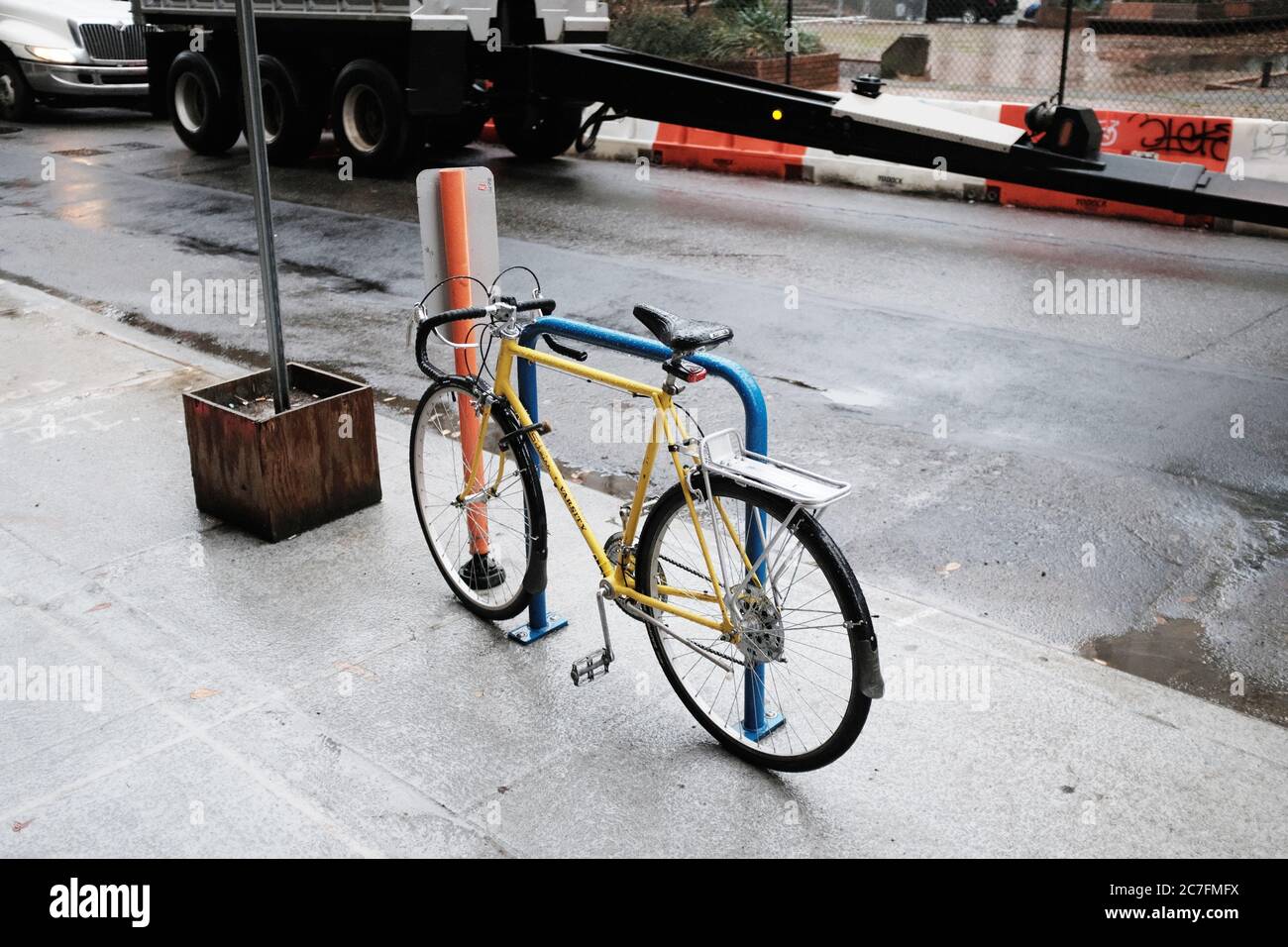 PORTLAND, UNITED STATES - Dec 20, 2019: A bicycle parked on the sidewalk in Portland, the United States of America Stock Photo