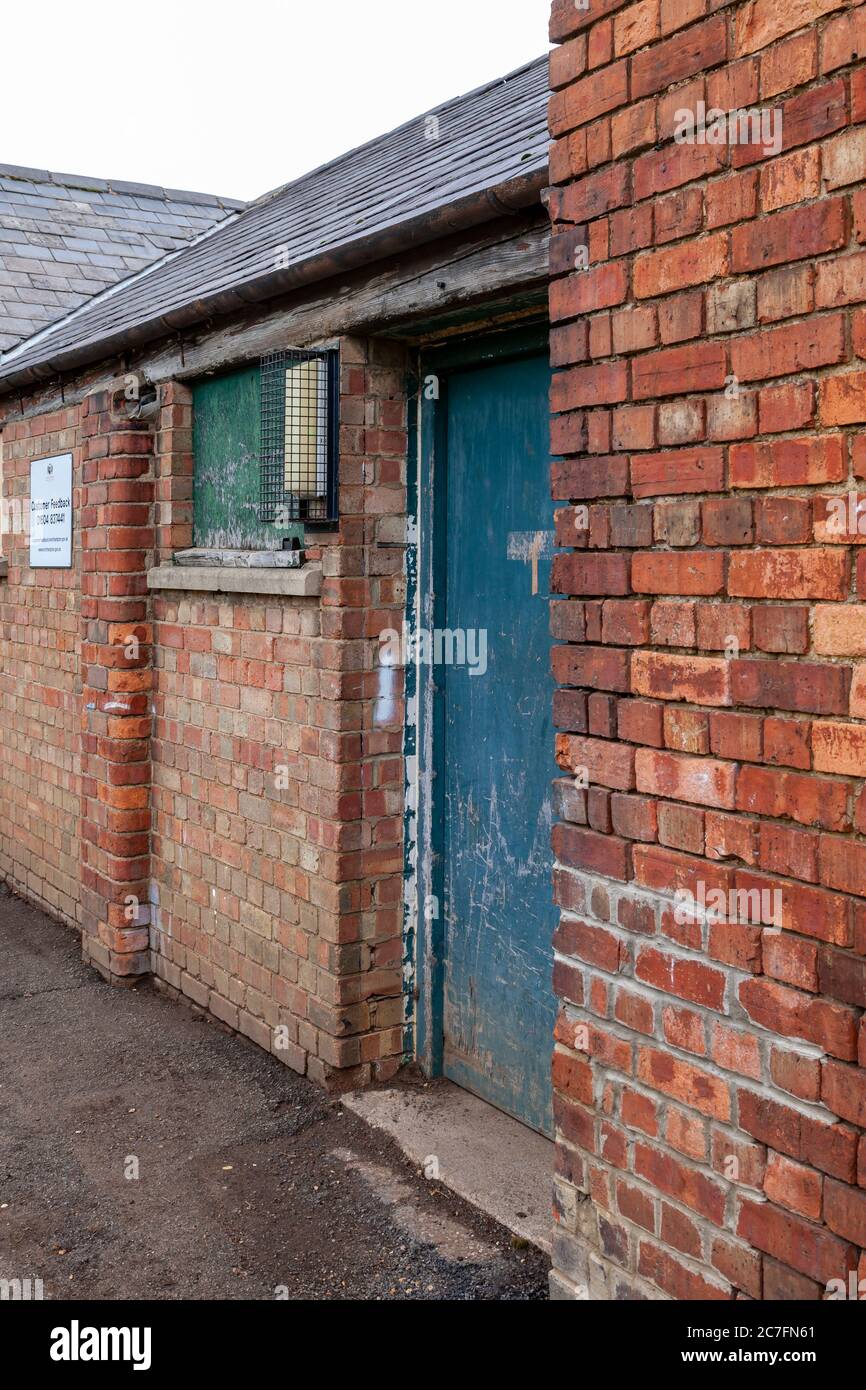 Old brick buildings used by the council in Abington Park, Northampton, England, UK Stock Photo