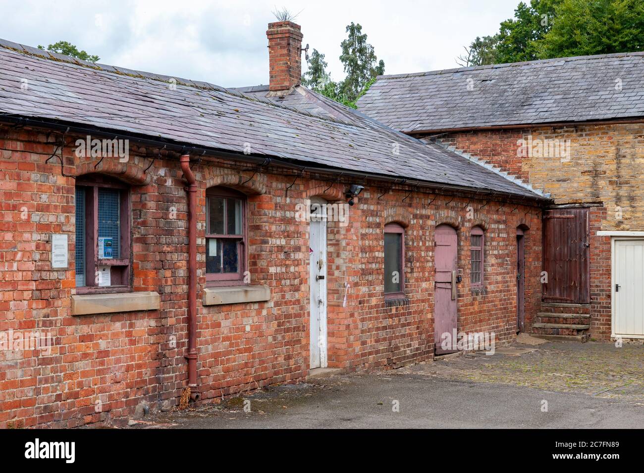 Old brick buildings used by the council in Abington Park, Northampton, England, UK Stock Photo