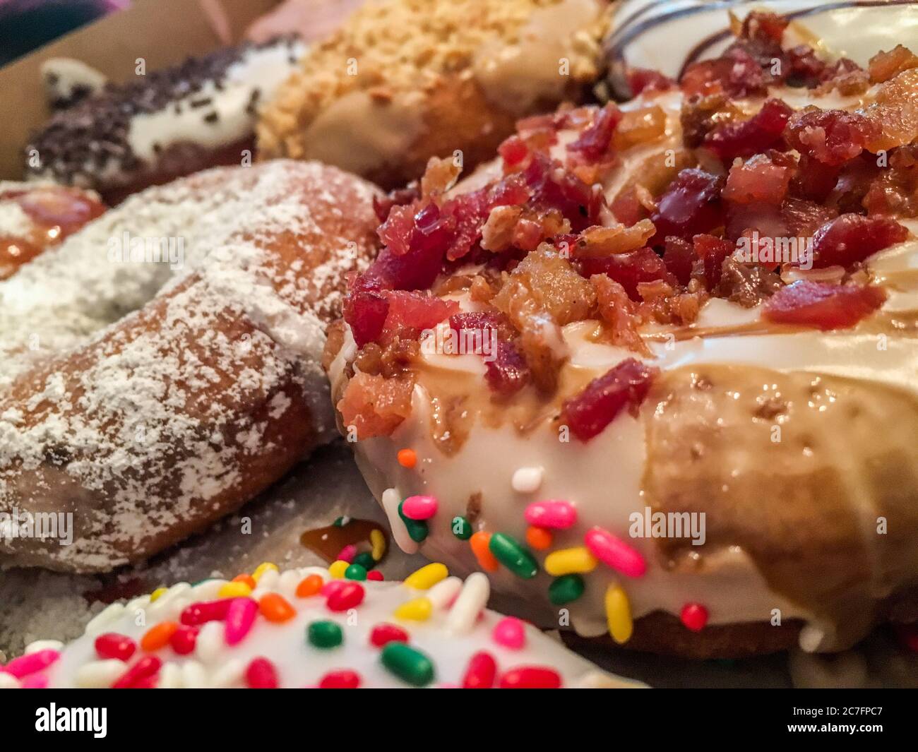 Freshly baked donuts sprinkles hi-res stock photography and images - Alamy