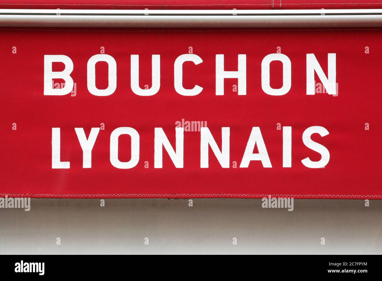 Bouchon Lyonnais restaurant sign on wall Stock Photo