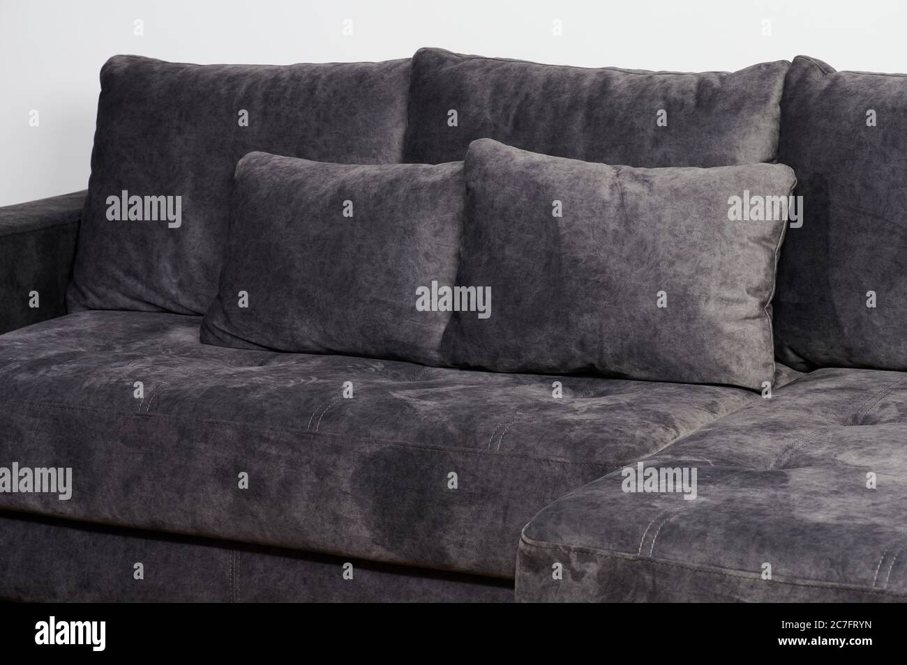 Dark gray soft sofa close up view isolated Stock Photo Alamy