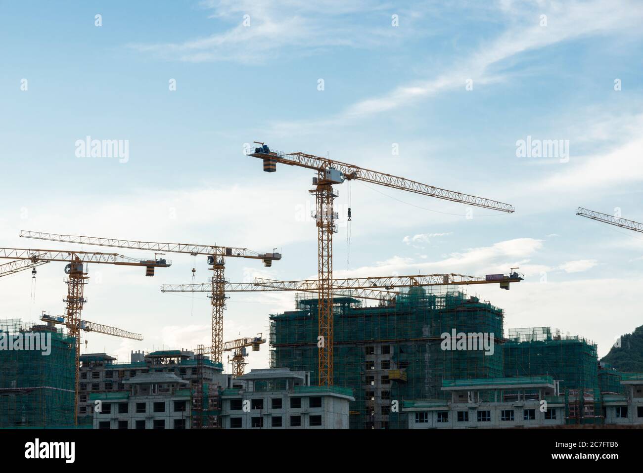Residential area under blue sky and white clouds Stock Photo - Alamy