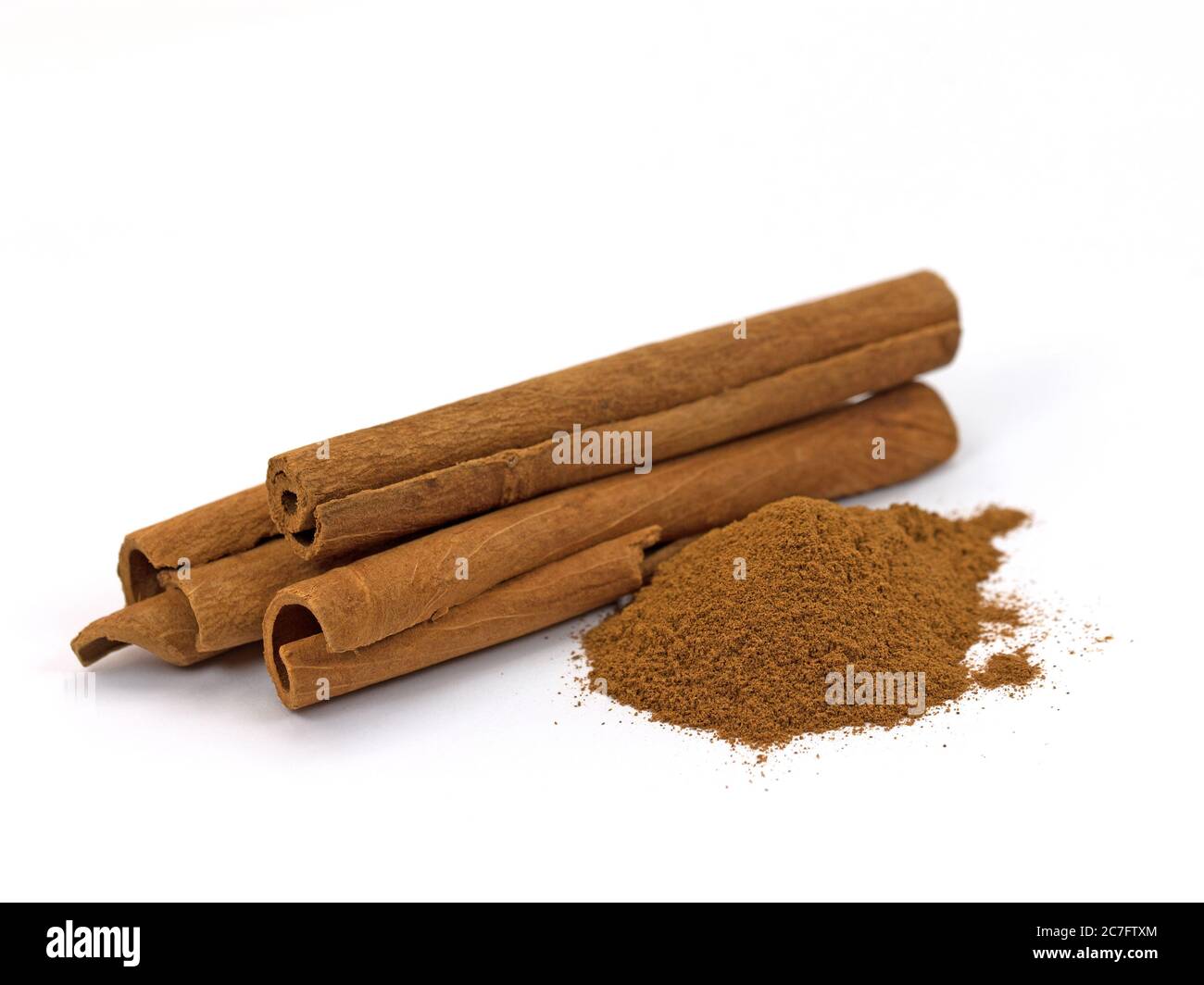 Cinnamon sticks isolated against a white background Stock Photo