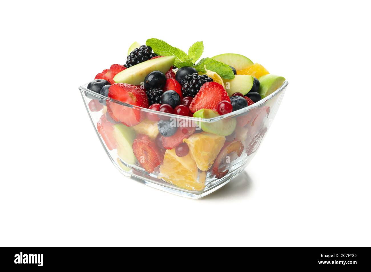 Bowl of fresh fruit salad isolated on white background Stock Photo - Alamy