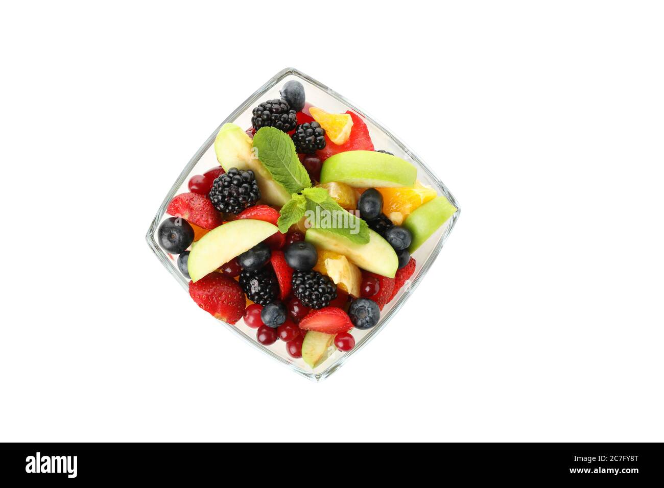 Bowl of fresh fruit salad isolated on white background Stock Photo - Alamy