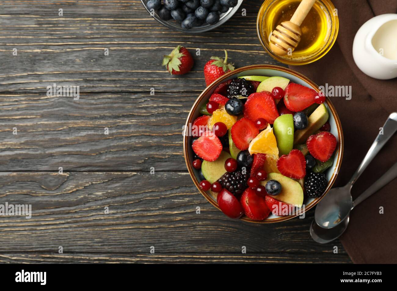 Composition With Bowl Of Fresh Fruit Salad On Wooden Background Top View Stock Photo Alamy