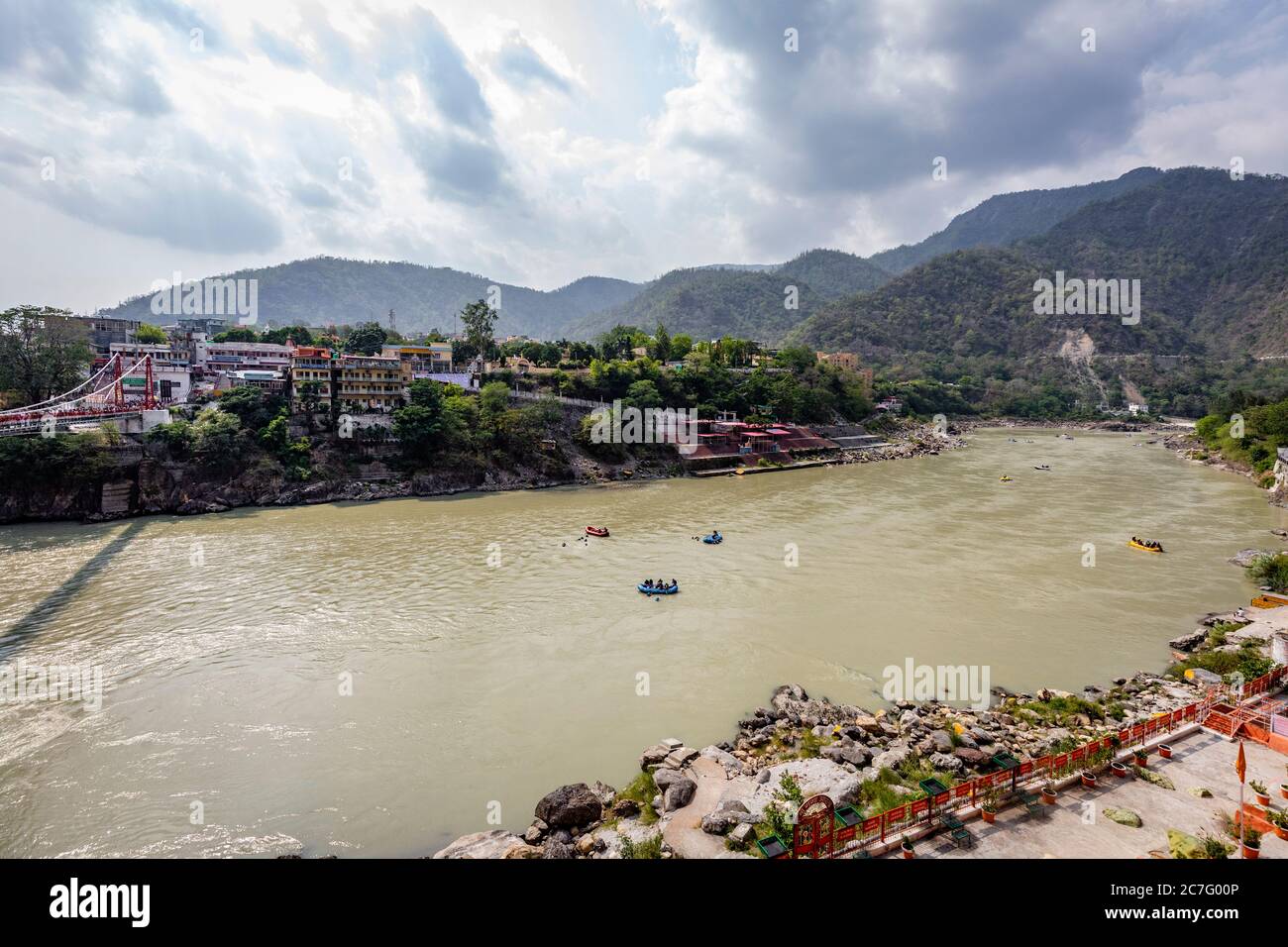 A wide angle view of the River Ganges in the holy town of Rishikesh in northern India Stock Photo
