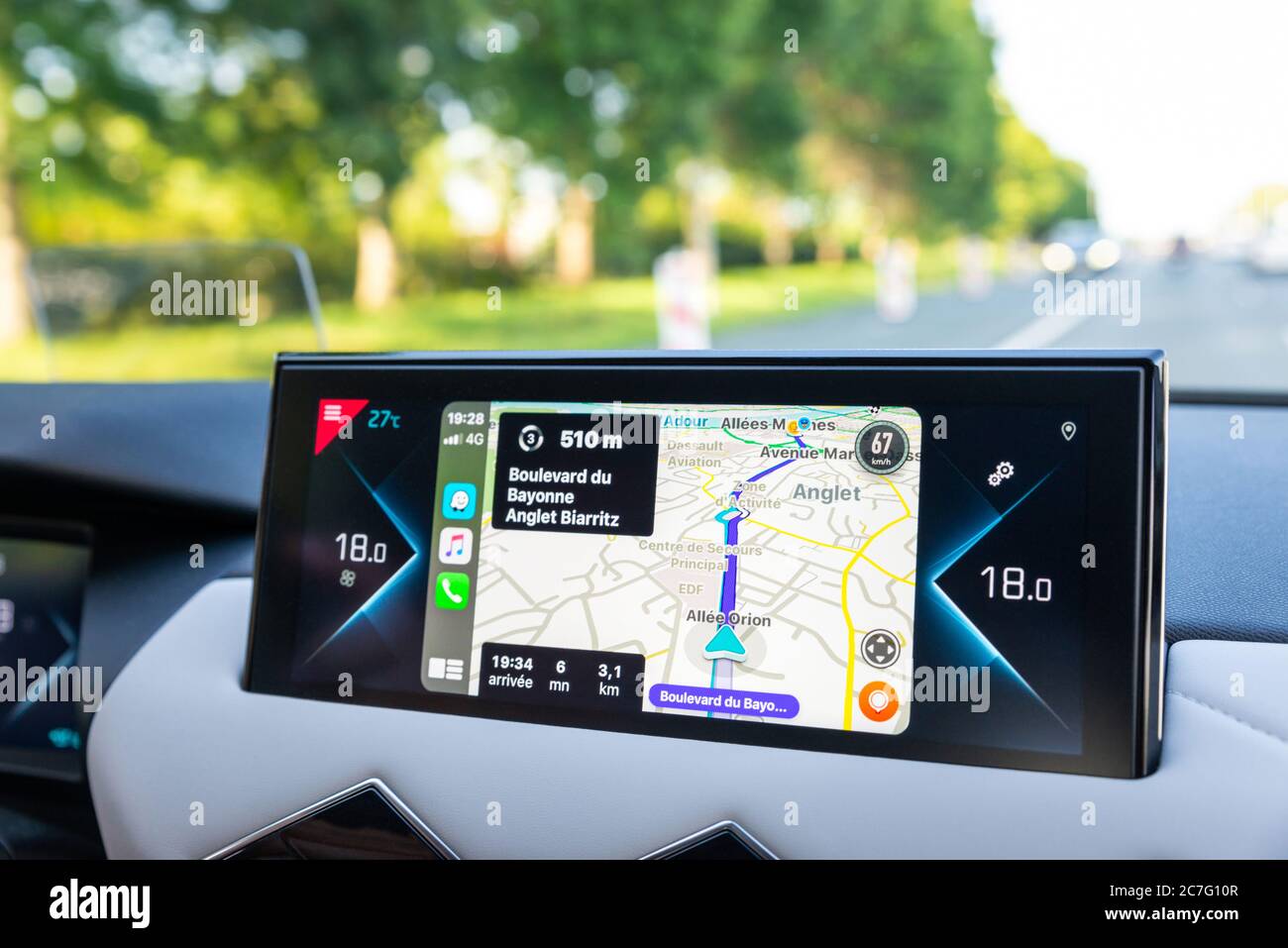 Waze app displayed on DS 3 Crossback's screen via Carplay. Stock Photo