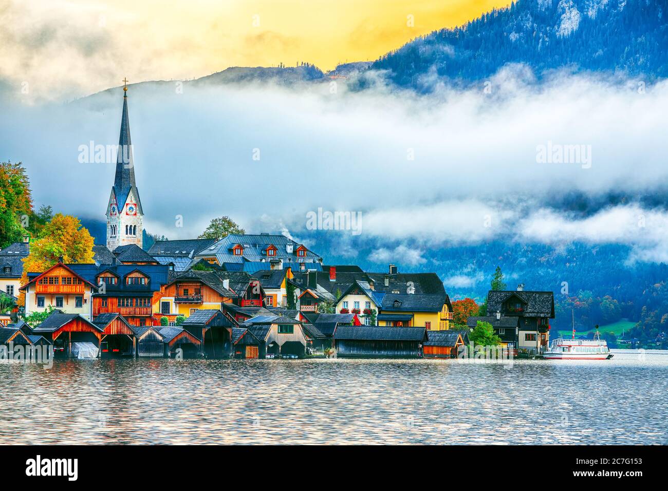 Scenic view of famous Hallstatt mountain village with Hallstatter lake ...