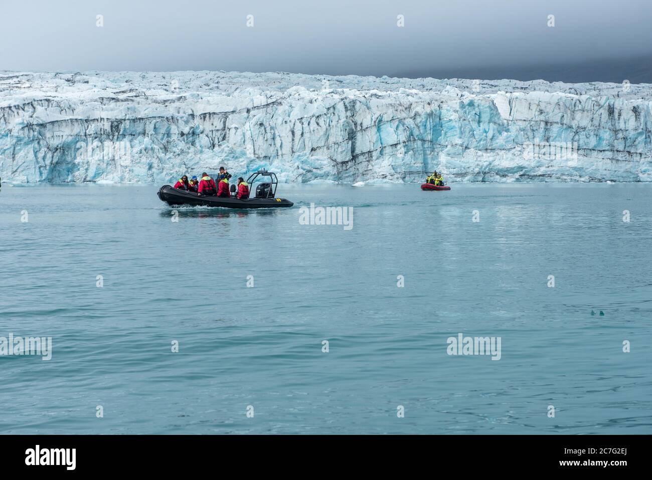 JOKULSARLON, ICELAND - MAY 23, 2019: Tourists taking a boat trip on Jokulsarlon glacial lagoon Stock Photo
