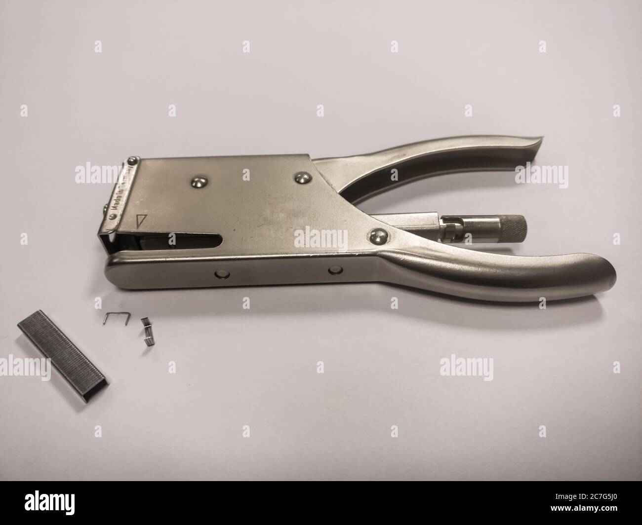 Staple Needle Metal staple with staple needles on a white background Stock Photo - Alamy