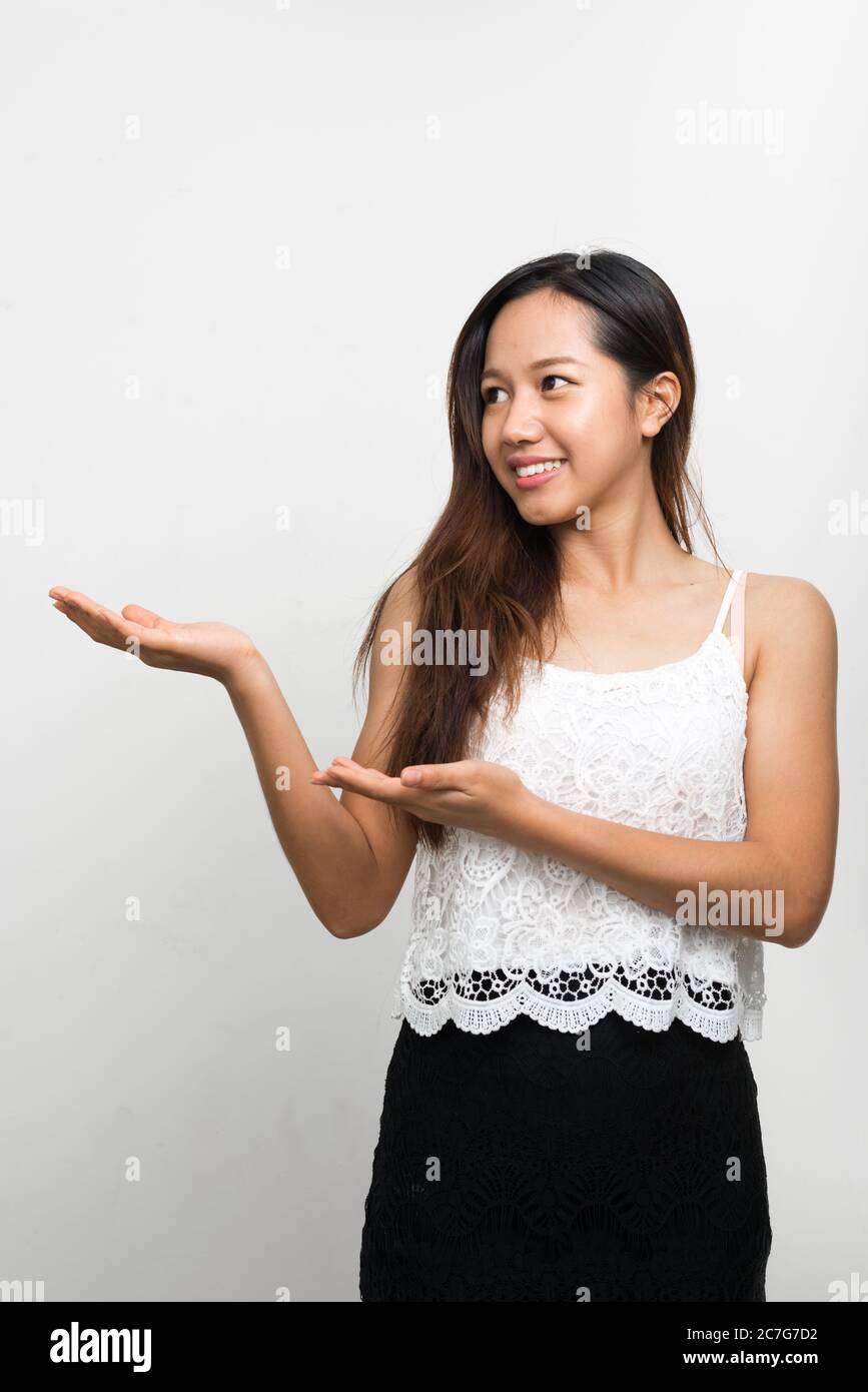 Portrait of happy young beautiful Asian woman Stock Photo - Alamy