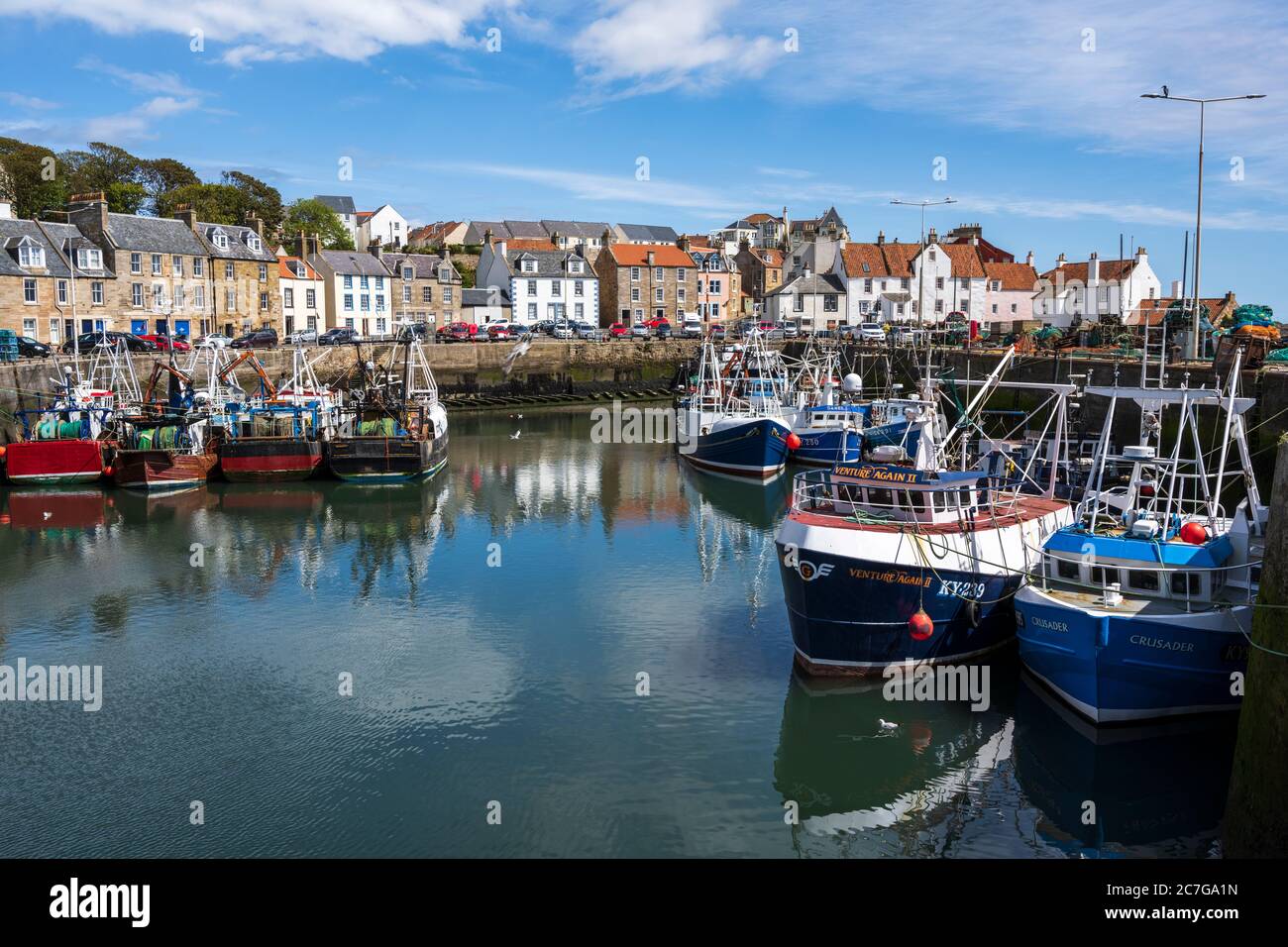 Fishing boats tied up in Pittenweem harbour in East Neuk of Fife, Scotland, UK Stock Photo