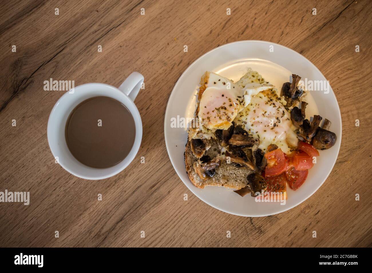 Breakfast plate with egg, toast and coffee Stock Photo