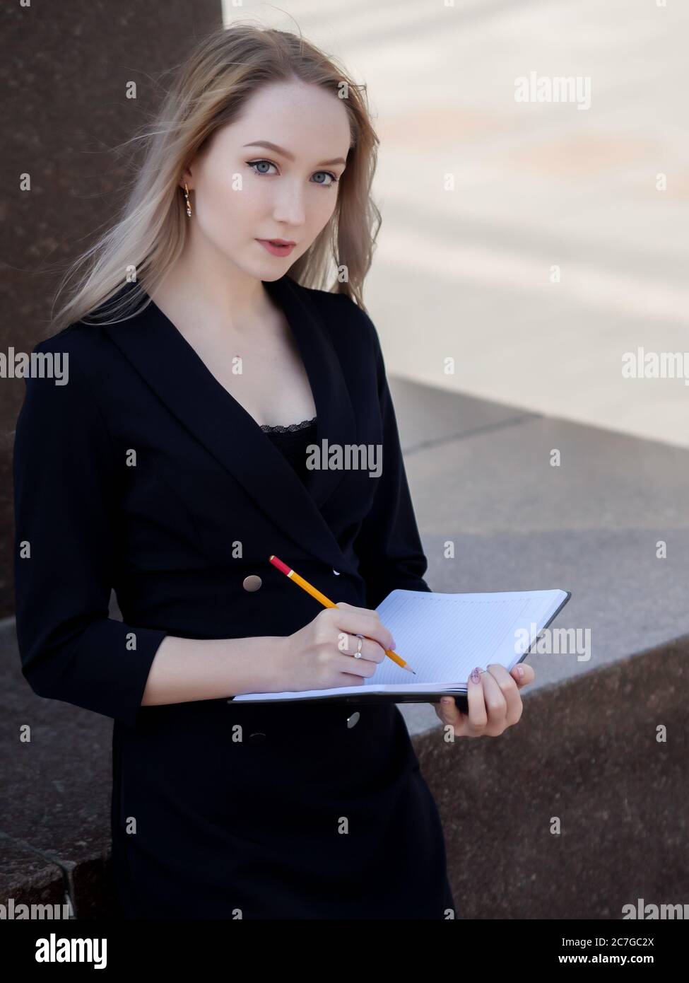 Woman thinking pen pencil hi-res stock photography and images - Alamy