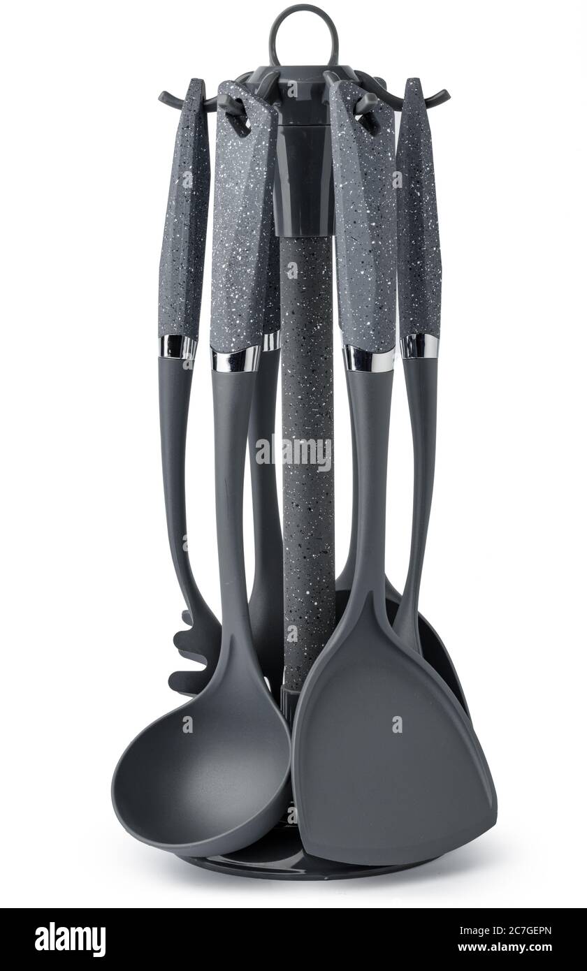 Stand with set of kitchen utensils on white background Stock Photo Alamy