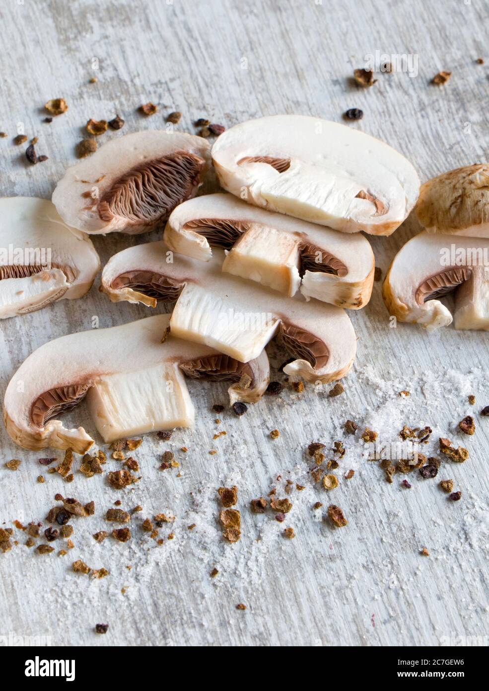 Mushrooms fungus on the white table, spaghetti and species. Ingredients for spaghetti Stock