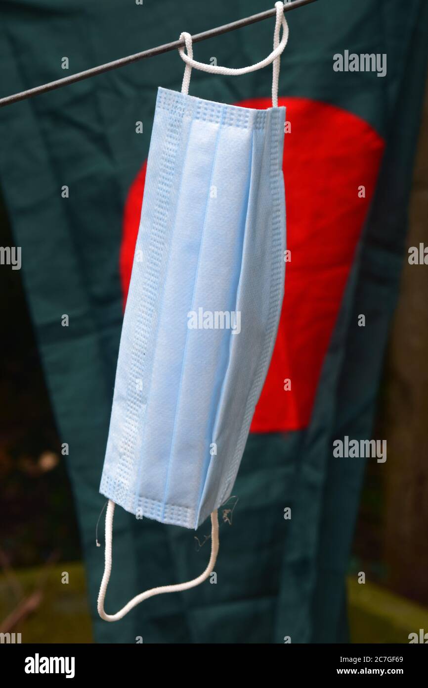 surgical face mask in front of national flag of Bangladesh Stock Photo Alamy